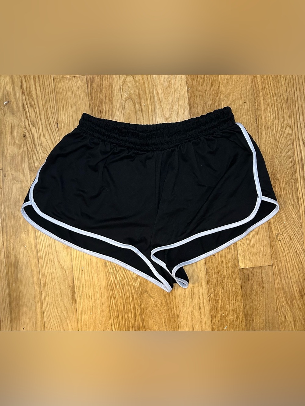 Kids Black + white striped running shorts Size XL